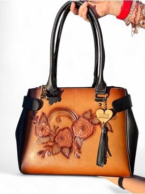 hand-tooled leather handbag